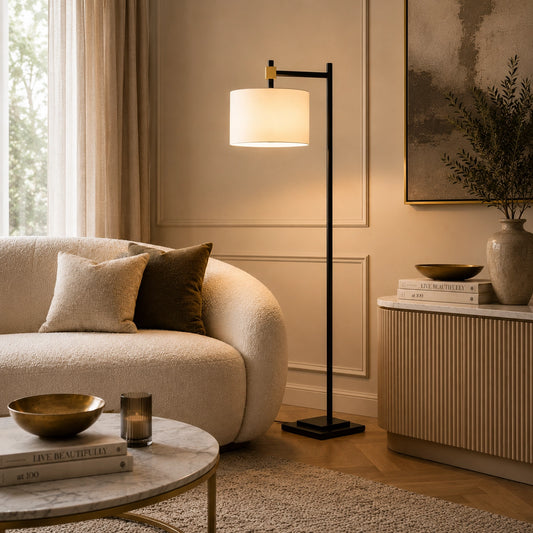 Modern floor lamp featuring a matte black frame and white fabric shade