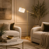 Edge brass floor lamp with adjustable white fabric shade