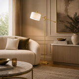 Luxury adjustable floor lamp with brushed brass finish and white shade
