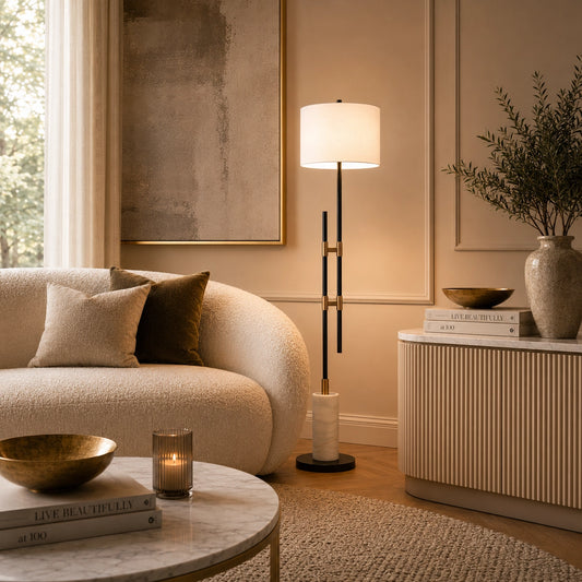 Modern black floor lamp featuring a marble base and white fabric shade