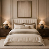 Contemporary bedside lamp with matte black base and beige fabric shade